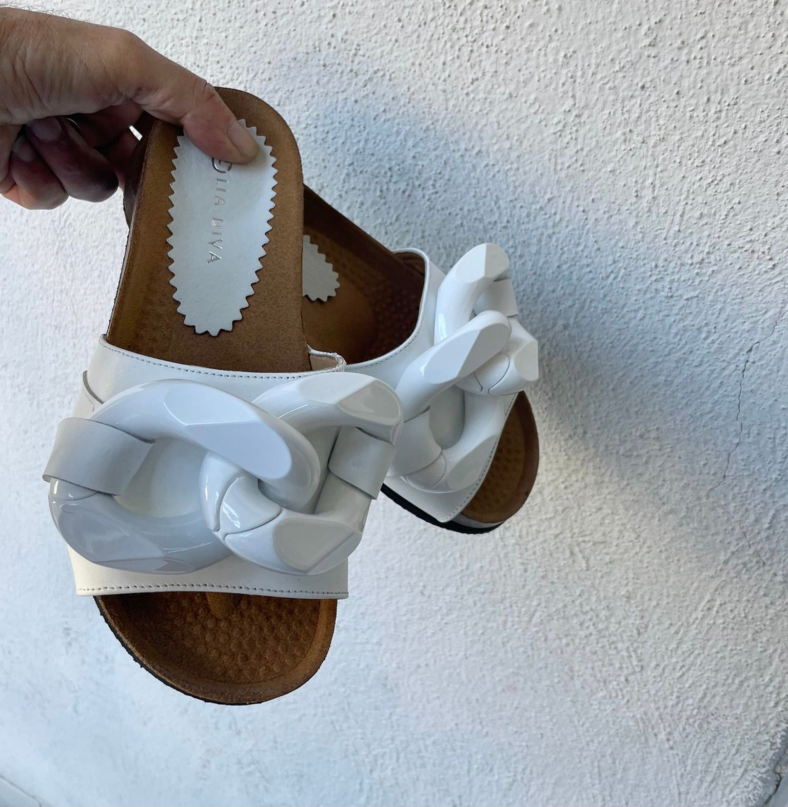 Zapatilla de cadena blanca